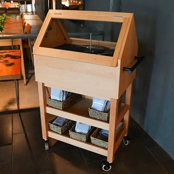Cheese cart sculpture by Ingemar Hagen-Keith at Rex Hill.
